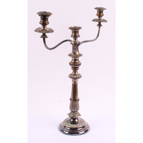 47 - A silver on copper two branch metamorphic table candlestick, pair of detachable sconces, the support... 