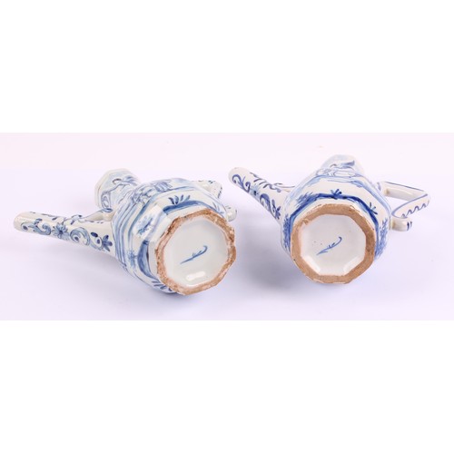 1009 - A Continental Delft oil and vinegar cruet set, comprising two bottles and a stand, the bottles 17.5c... 