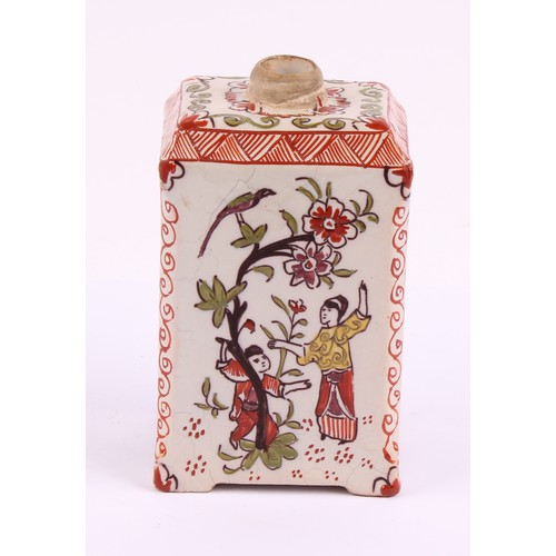 1010 - A Dutch Delft polychrome tea canister, in the chinoiserie taste, decorated with figures beside a flo... 