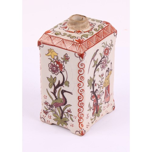 1010 - A Dutch Delft polychrome tea canister, in the chinoiserie taste, decorated with figures beside a flo... 