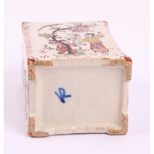 1010 - A Dutch Delft polychrome tea canister, in the chinoiserie taste, decorated with figures beside a flo... 