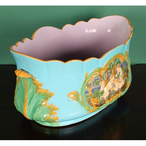 777 - A large Victorian Minton majolica lobed jardiniere, moulded with putti, leafy handles, turquoise gro... 