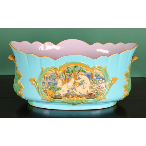 777 - A large Victorian Minton majolica lobed jardiniere, moulded with putti, leafy handles, turquoise gro... 