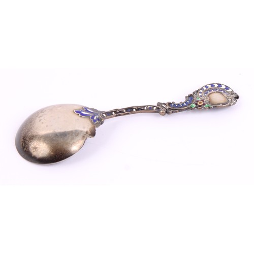 21 - A 19th century silver coloured metal and enamel spoon, probably Russian, in the Rococo taste, 11.5cm... 