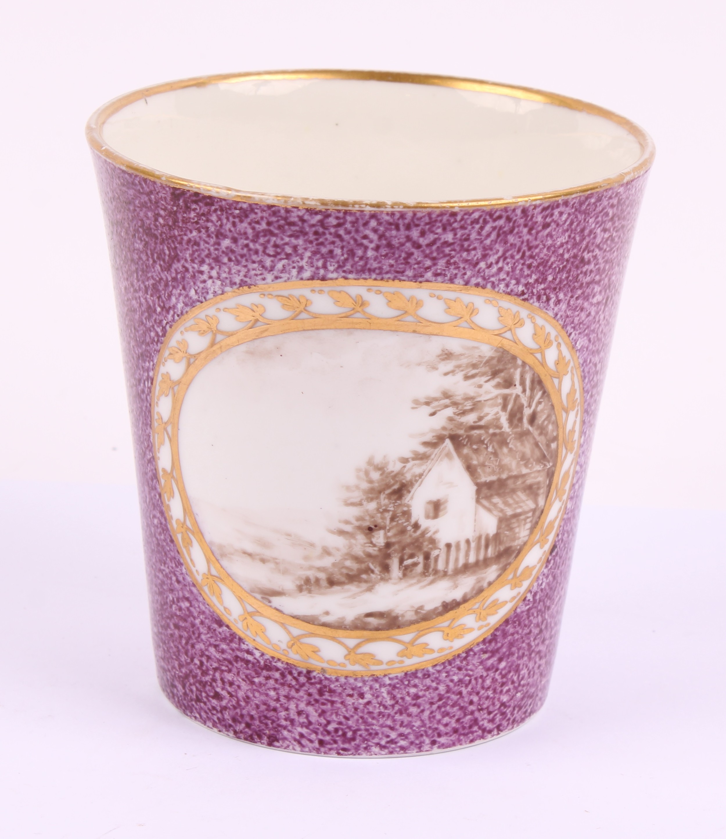 A Pinxton porcelain beaker, painted in sepia with rural cottage scenes ...