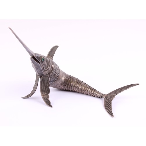 36 - A Continental silver plated articulated desk model, of a swordfish, green glass eyes, 48cm long, fir... 