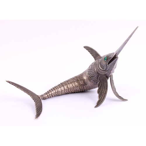 36 - A Continental silver plated articulated desk model, of a swordfish, green glass eyes, 48cm long, fir... 