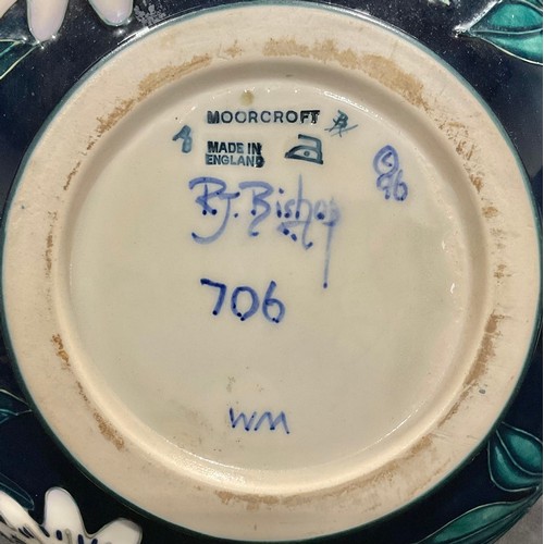 5013 - A Moorcroft bottle vase, Carousel pattern, designed by Rachel Bishop, tube lined with flowers on a g... 