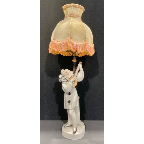 5063 - Dorothea Charol (1889-1963) Art Deco porcelain figural lamp base of a musical Pierrot, turned wooden... 