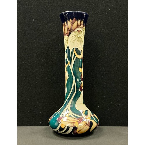 5073 - A Moorcroft bottle vase, Water Nymph pattern, designed by Kerry Goodwin, tube lined with nymphs and ... 