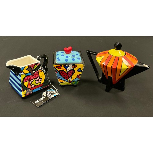 5083 - A Romero Britto cream jug and sucriere set, number #330306, the sucriere 11.5cm high; a Louis reprod... 