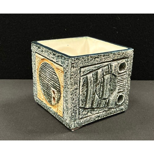 5084 - A Troika cube vase, by Jane Fitzgerald, decorated and incised with geometric shapes in shades of oat... 