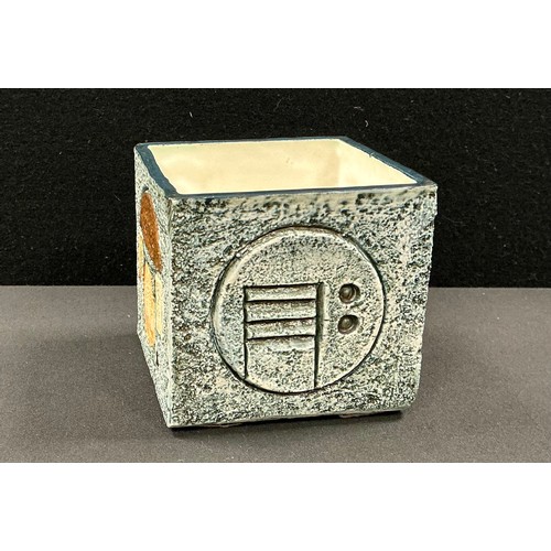 5084 - A Troika cube vase, by Jane Fitzgerald, decorated and incised with geometric shapes in shades of oat... 