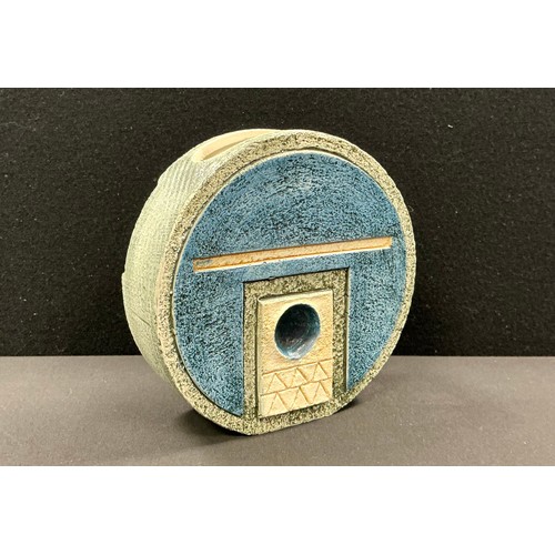 5089 - A Troika wheel vase, by Sue Lowe, decorated with roundels and geometric shapes in shades of green, b... 