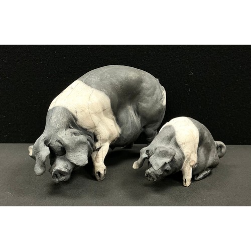 5091 - Christine Cummings (1969-2023) a raku sculpture of a saddleback pig, incised CC mark, dated Sept 20,... 