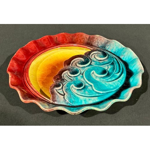 5103 - An Ault Pottery shaped circular wall vase designed by Christopher Dresser (1834 - 1904), moulded as ... 