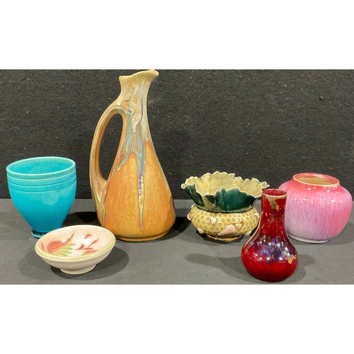 5120 - A Bernard Moore flambé miniature vase, 8.5cm high, painted BM mark; a Doulton Lambeth posy vase, dec... 