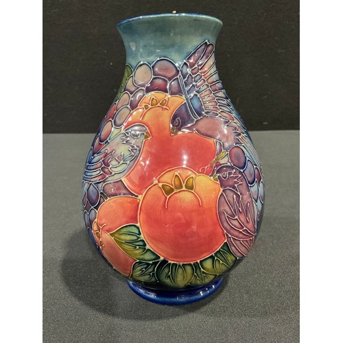 5079 - A Moorcroft Finches pattern ovoid vase, designed by Sally Tuffin, tube lined with finches and fruit ... 