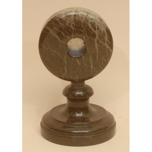 A Cornish serpentine table top aneroid barometer, silvered register ...