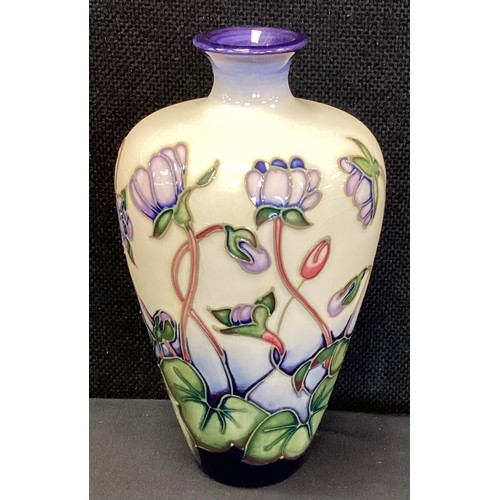 6 - A Moorcroft pottery vase, Ashwood Hepatica pattern, designed by Emma Bossons, 16cm high.