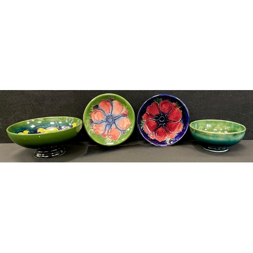 10 - Moorcroft - a group of four Moorcroft bowls, various patterns including, Clematis, Poppy, others, 11... 