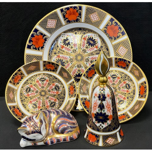 11 - A Royal Crown Derby 1128 Old Imari side plate, two smaller pin dishes, printed marks, a bell, first ... 