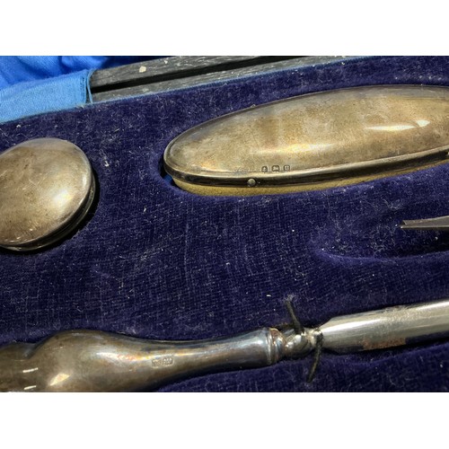 25 - Silver and metal ware - a silver handled manicure set, Birmingham, cased;  silver-plated teapot, pew... 