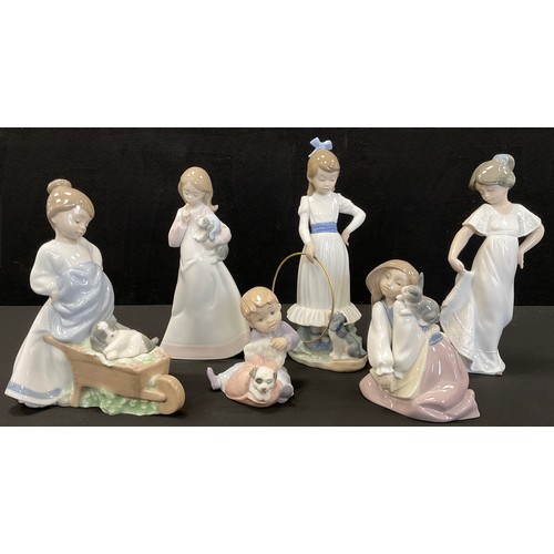 26 - NAO- six assorted figures inc The colours of my garden, My dog does tricks, and now to bed, Bunny’s ... 