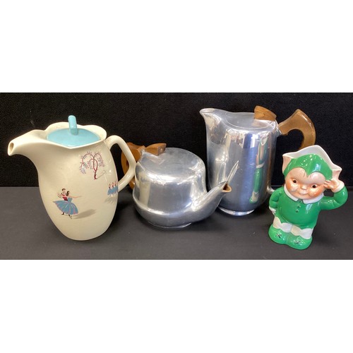 36 - A Mabel Lucie Attwell `Boo Boo` a novelty Shelley pottery figural milk-jug, printed marks to base, 1... 