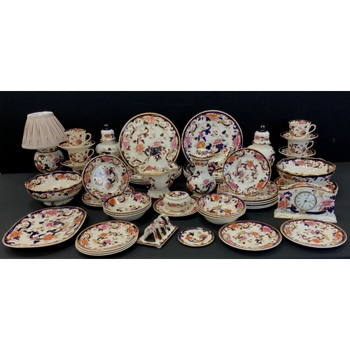 53 - An extensive Masons Ironstone Mandalay pattern table service inc ten dinner plates, six cups and sau... 
