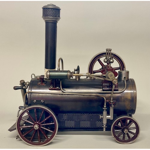 6018 - An early 20th century Bing live steam traction engine, chain drive to rear wheel, single fixed cylin... 