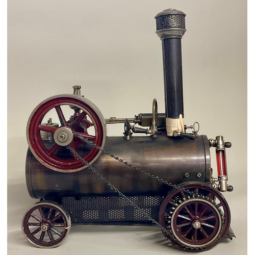 6018 - An early 20th century Bing live steam traction engine, chain drive to rear wheel, single fixed cylin... 