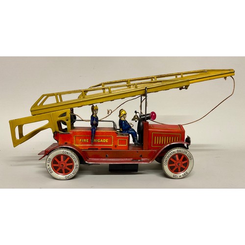 6001 - An early 20th century Distler (Germany) tinplate clockwork fire engine with electric light, four sea... 