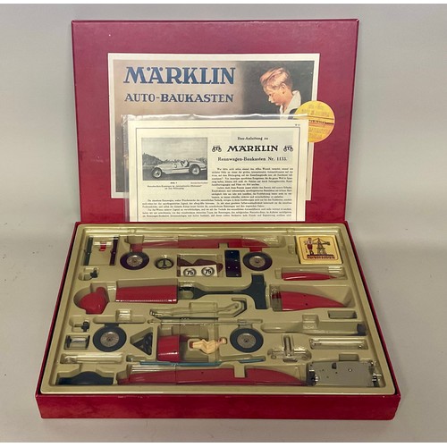 6003 - A 1980’s Märklin 75th anniversary clockwork racing car kit, titled Marklin No.1076  Auto-Baukasten, ... 