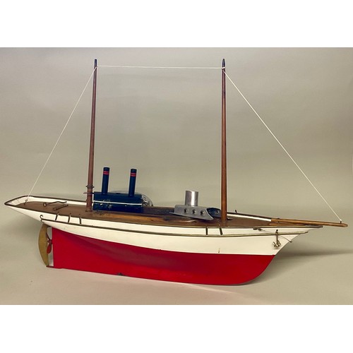 6011 - A live steam pond yacht / hobby yacht, red hull with wooden decking and rigging, with boiler to inte... 