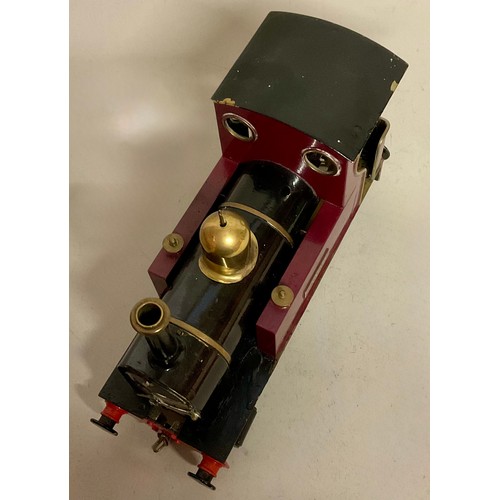 6022 - Live Steam - A scratch built live steam 1 Gauge 0-4-0 locomotive, with burgundy livery, red buffer b... 