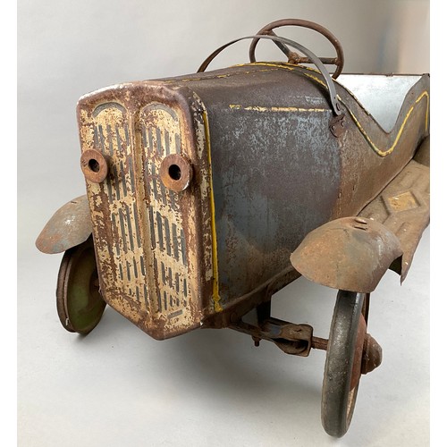 6006 - A pressed steel pedal car, c.1930, 45.5cm high (to top of steering wheel), 106cm long, 49cm wide