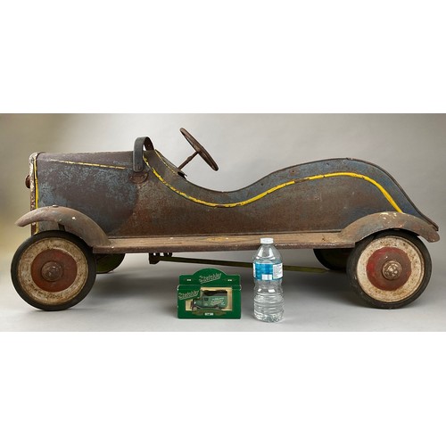 6006 - A pressed steel pedal car, c.1930, 45.5cm high (to top of steering wheel), 106cm long, 49cm wide