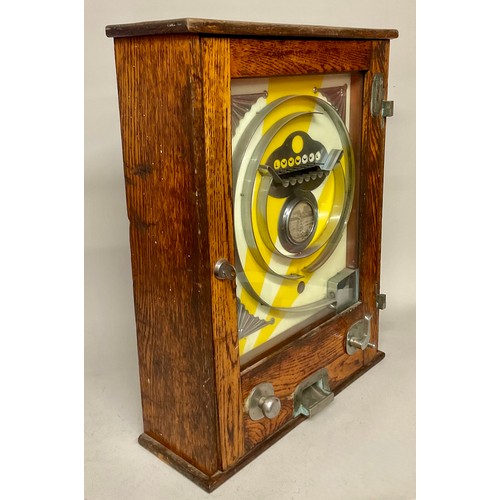 A mid 20th century Allwin penny slot pinball machine, oak case, 60.5cm ...