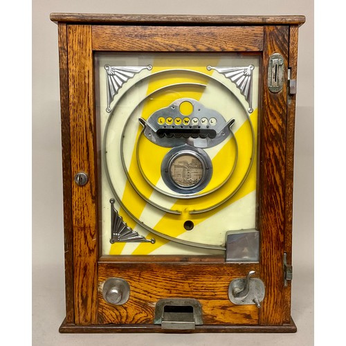 A mid 20th century Allwin penny slot pinball machine, oak case, 60.5cm ...
