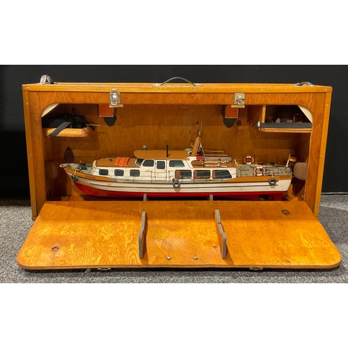 6045 - A hand made model radio controlled boat, in a carry/display case, Futaba, the wooden outer hinged ca... 