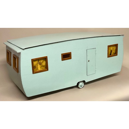 6046 - A scratch built child's model caravan, fitted with accessories and dolls, 34cm high, 80cm wide