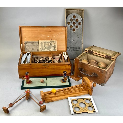 6044 - Toys & Juvenalia - a 19th century French set of boules, the stained pine box naively painted with na... 