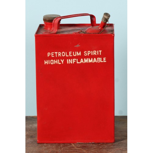 8003 - A 1970's ten litre can, FINNIGAN'S WAXOYL, illustrated with a car and instructions, 38cm high; a pet... 