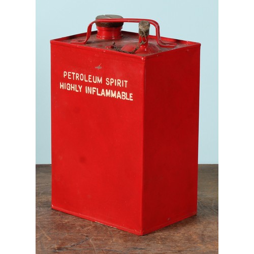8003 - A 1970's ten litre can, FINNIGAN'S WAXOYL, illustrated with a car and instructions, 38cm high; a pet... 