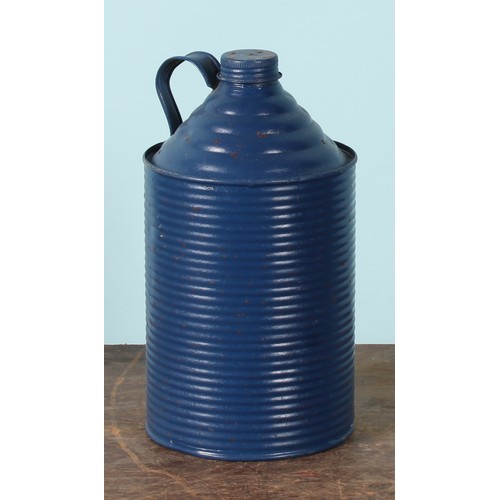 8003 - A 1970's ten litre can, FINNIGAN'S WAXOYL, illustrated with a car and instructions, 38cm high; a pet... 