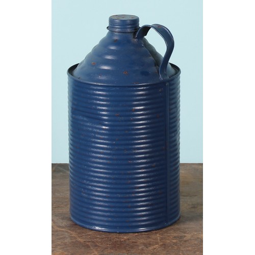 8003 - A 1970's ten litre can, FINNIGAN'S WAXOYL, illustrated with a car and instructions, 38cm high; a pet... 