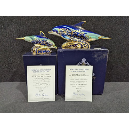 5048 - A pair of Royal Crown Derby paperweights, comprising Lyme Bay Dolphin and Lyme Bay Baby Dolphin, sec... 
