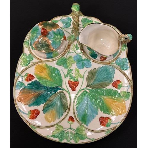1012 - A 19th-century Majolica strawberry server by Copeland, featuring intricately moulded strawberry and ... 
