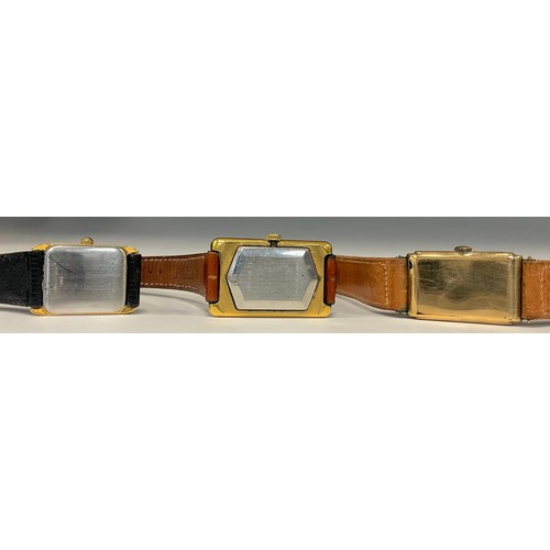 1034 - Longines  - a 10k rolled gold and stainless steel rectangular tank case wristwatch, case no. 569561,... 